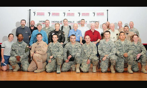 neil-armstrong-second-from-right-middle-row-visits-with-usaf-members-in-southwest-asia-2010