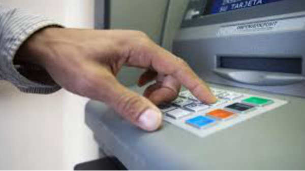 ATM మెషిన్ లోని సాఫ్ట్ వేర్లో చిన్న మార్పు....
